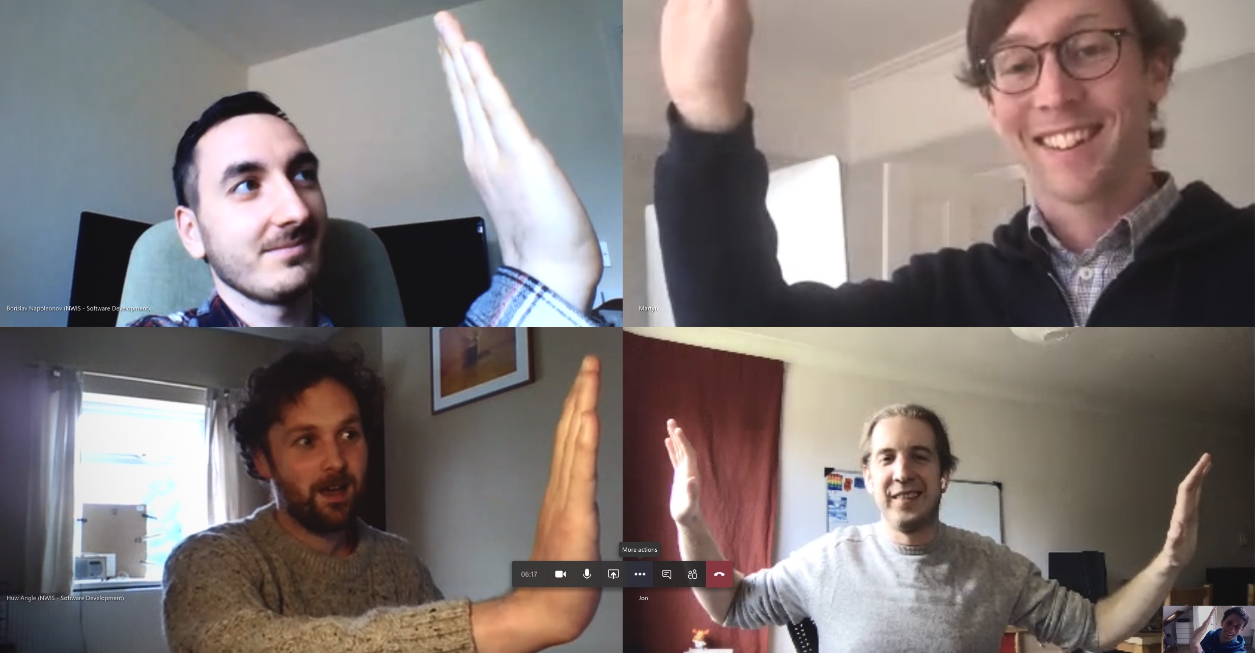 Image of four men in a digital meeting on a computer screen