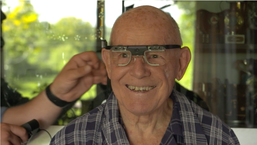 Patient wearing eye tracking glasses