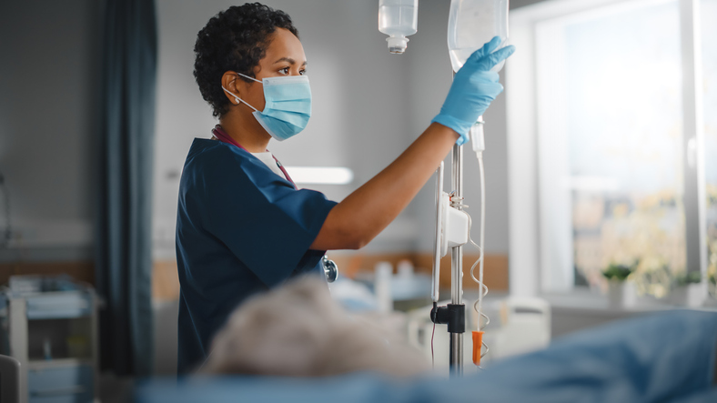 Nurse with IV fluid