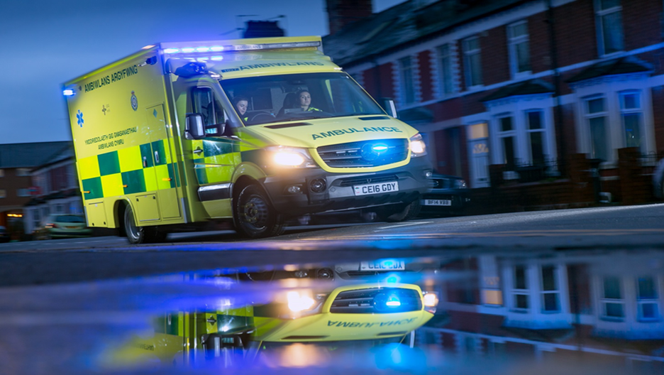 Ambulance driving through street