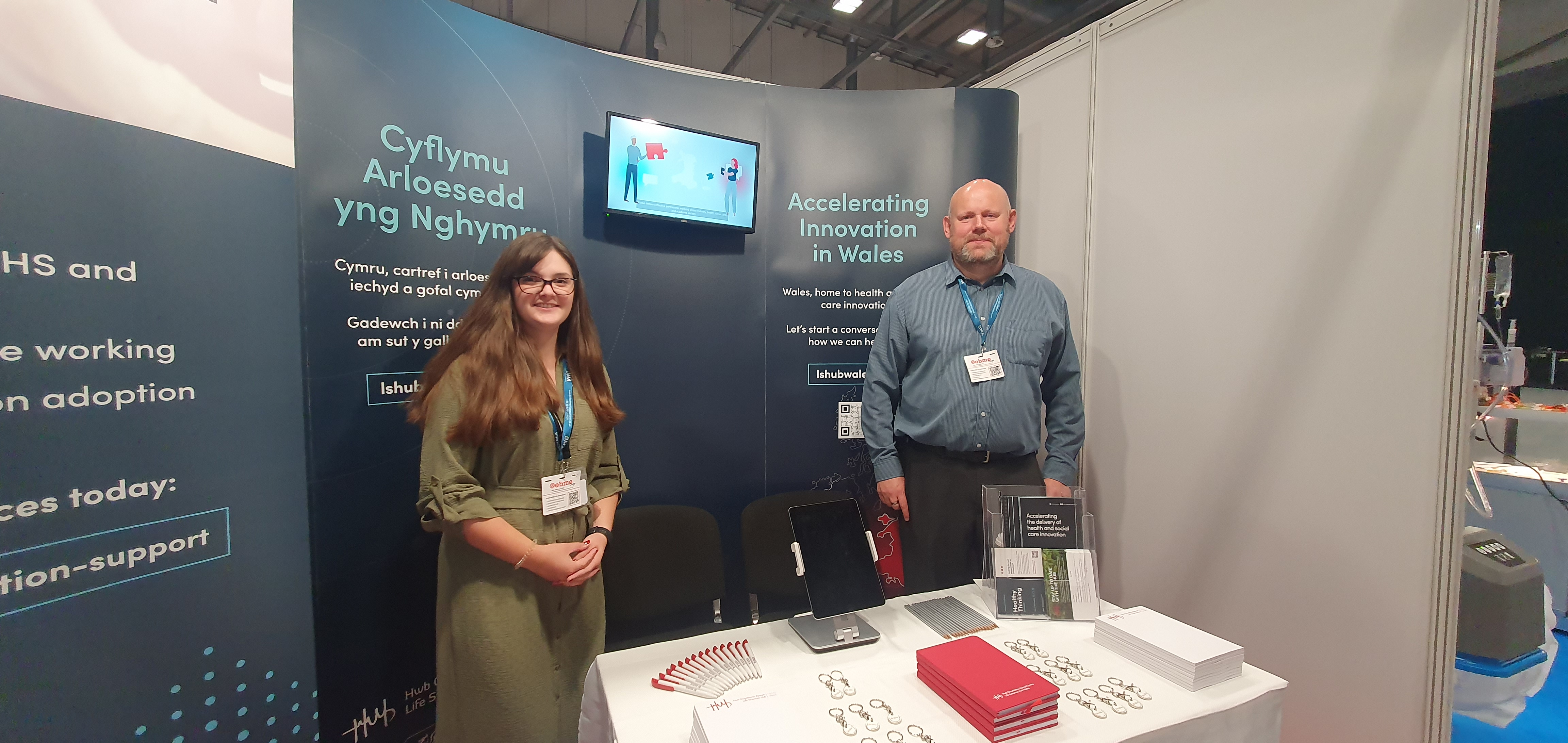 Hannah and Andrew at the Life Sciences Hub Wales stand