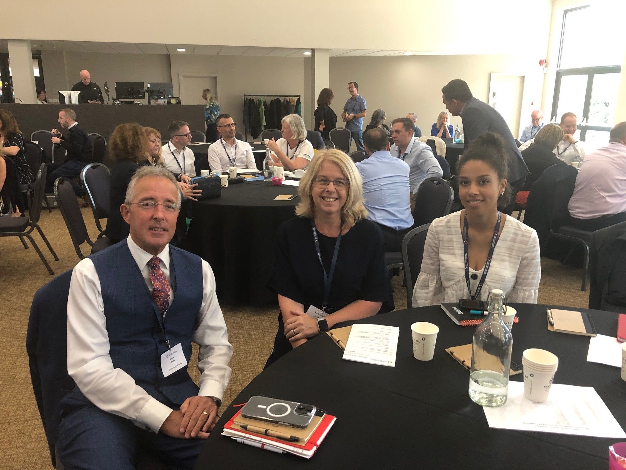 (left to right) Chris Martin, Cari-Anne Quinn and Lily Stubley-Adje sat around a table at Welsh NHS Confed Annual Conference 