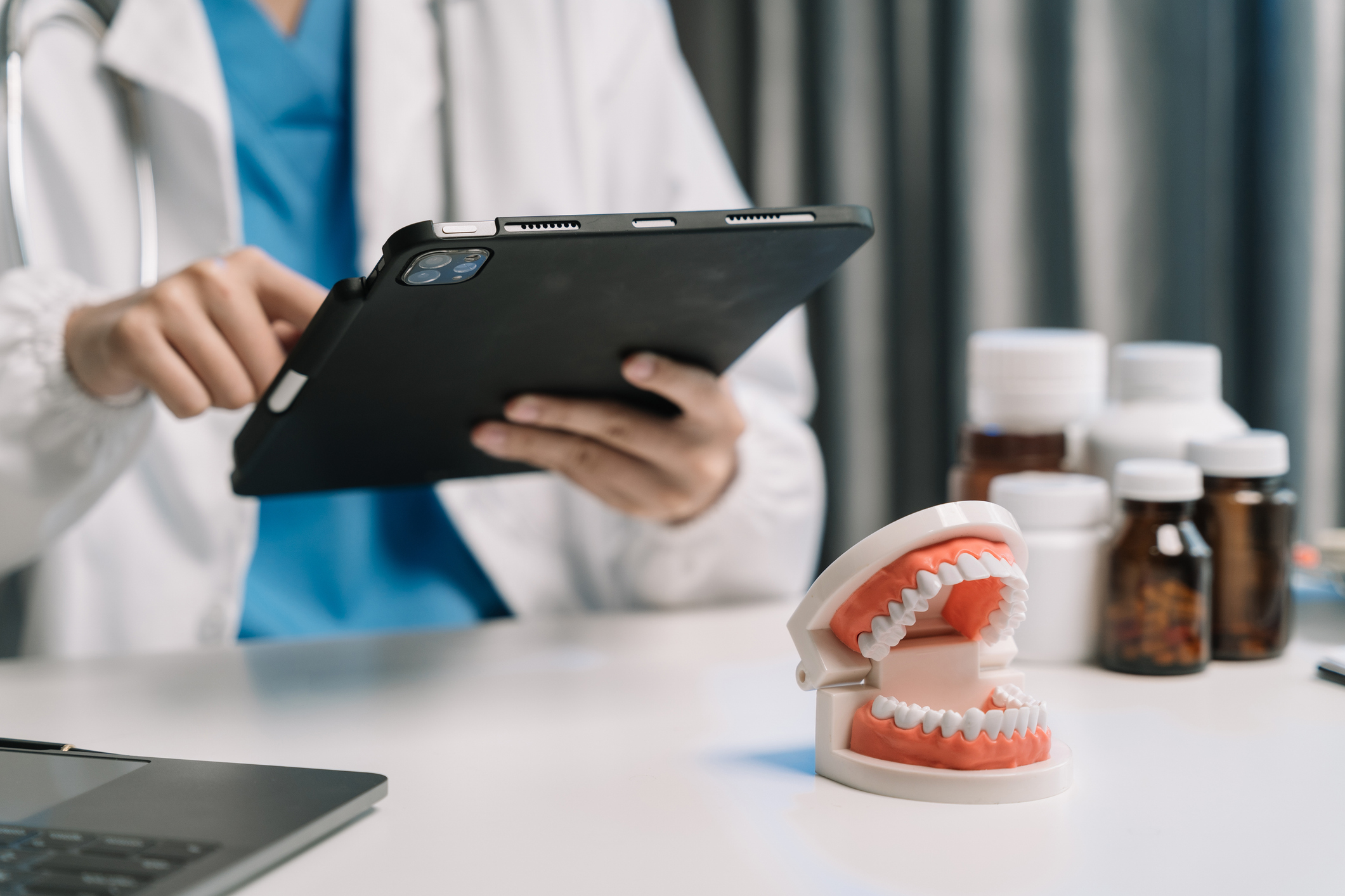 A dentist using an iPad