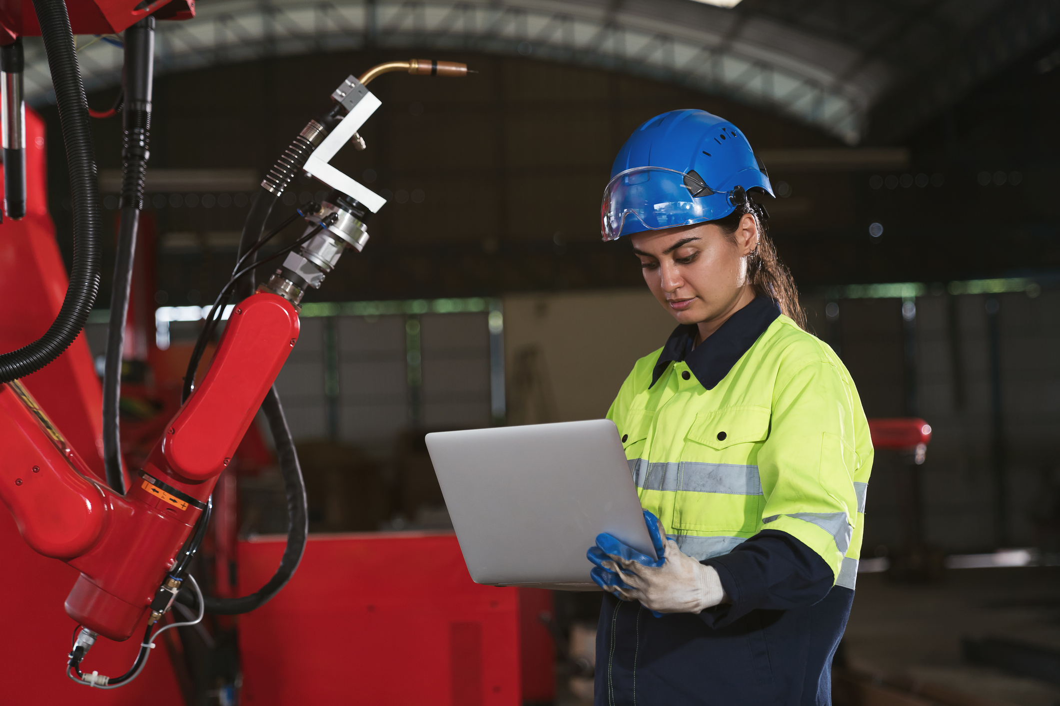 An engineer writing on a piece of paper