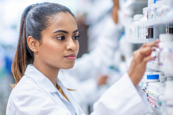 Pharmacist organising prescription