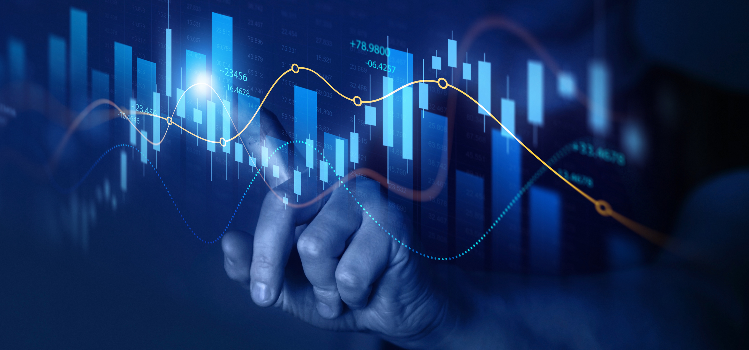 A finger pointing at a bar graph