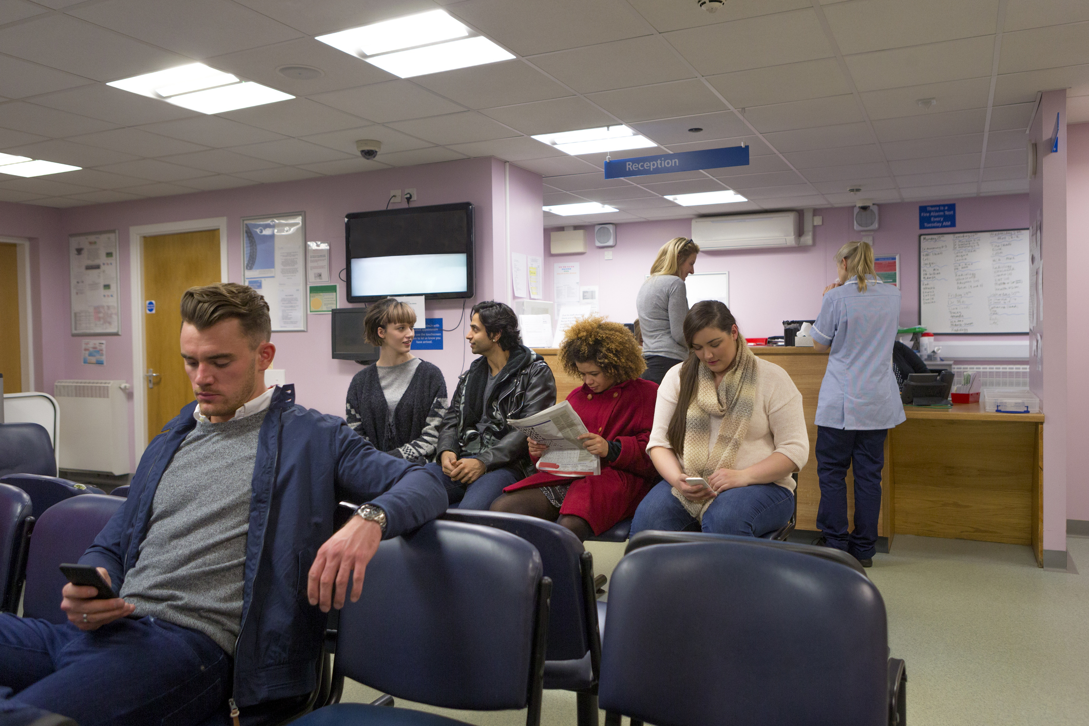 People sitting in a waiting room