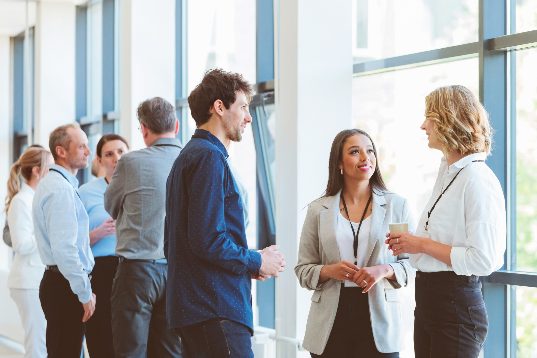 A group of people networking at an event