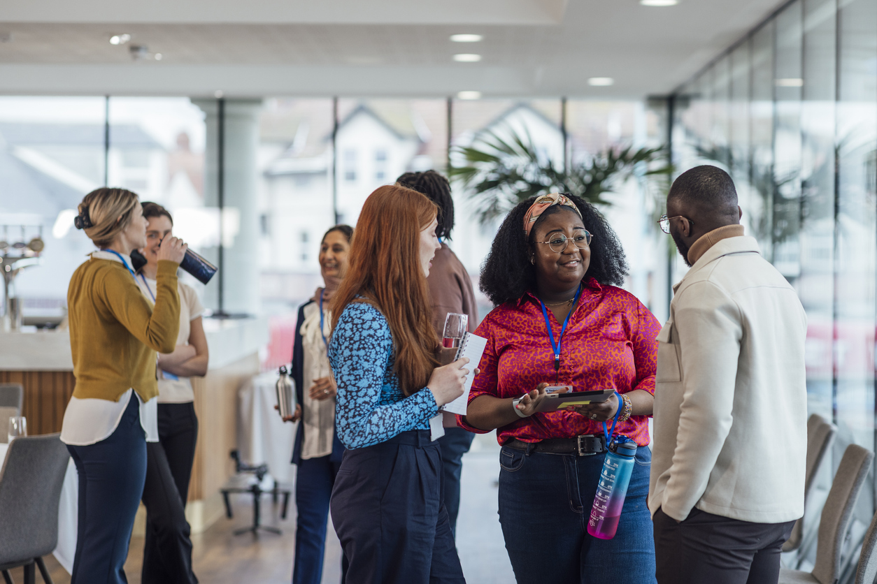 People talking at an event