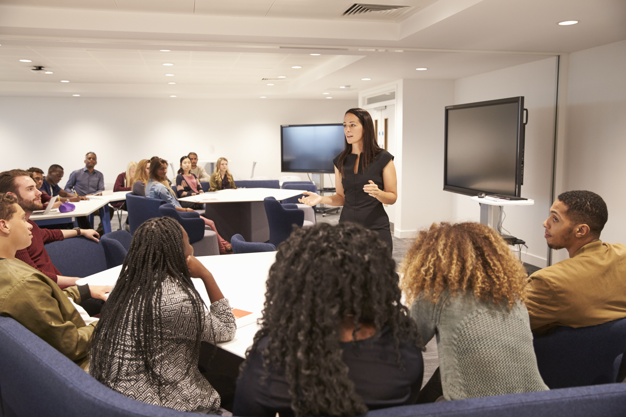 A woman speaking at a conference