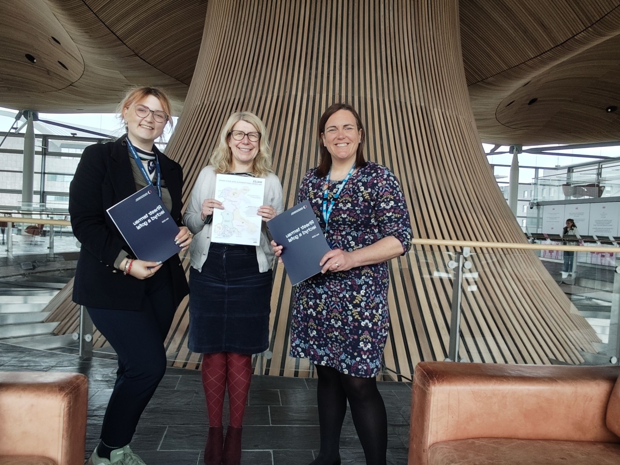 Welsh NHS Confederation team standing in the Senedd building.