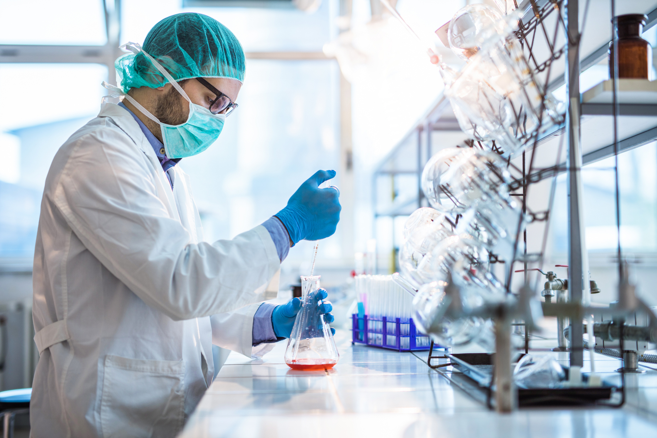 Male biotechnologist testing new chemical substances in a laboratory
