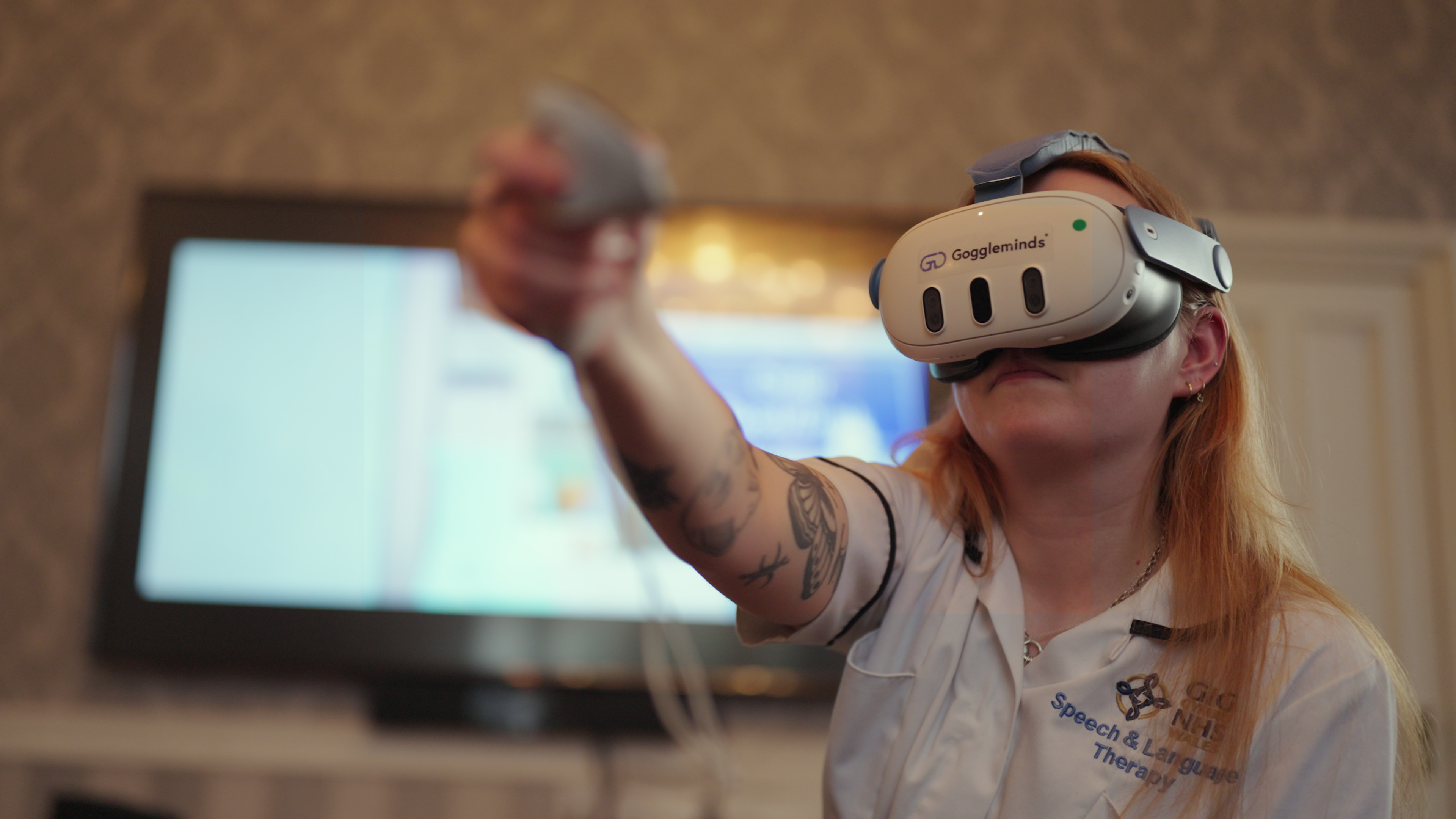 A carer using a VR headset