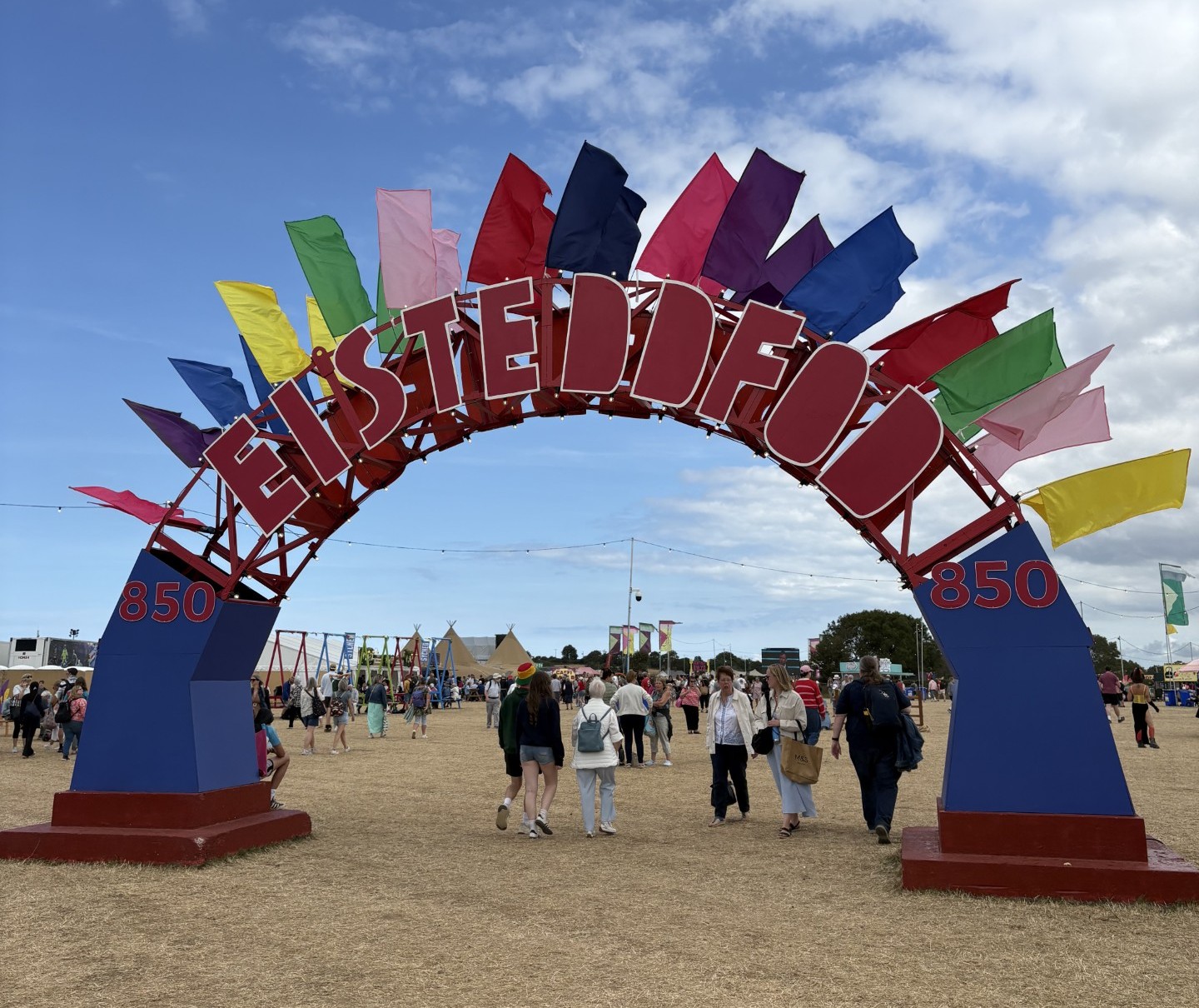 The Eisteddfod sign with a blue sky behind