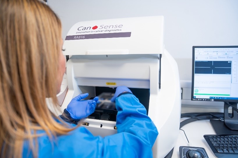A member of the CanSense team using their lab equipment