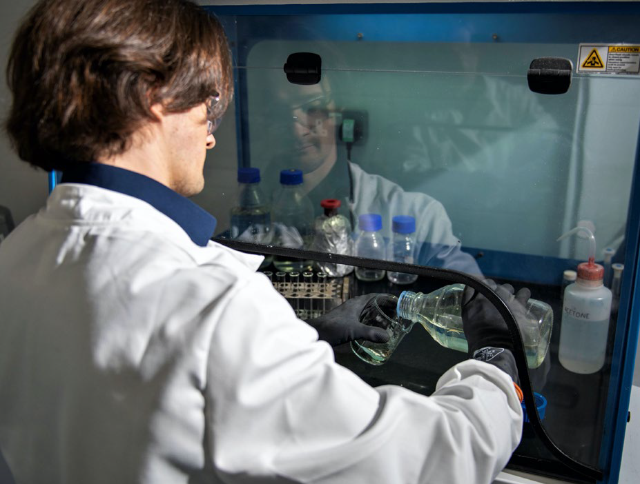 A photo of a man working in a lab